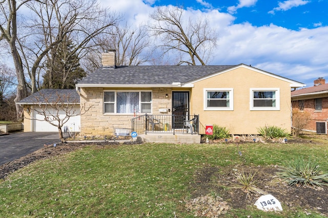 view of front facade featuring a garage, driveway, stone siding, a chimney, and a front lawn