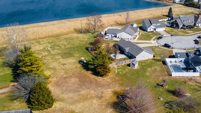 aerial view featuring a residential view and a water view