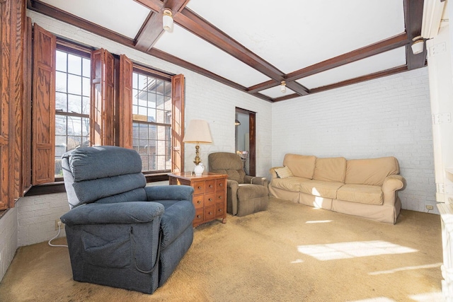 living room featuring brick wall, coffered ceiling, and beamed ceiling