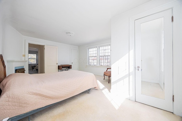 bedroom with light colored carpet