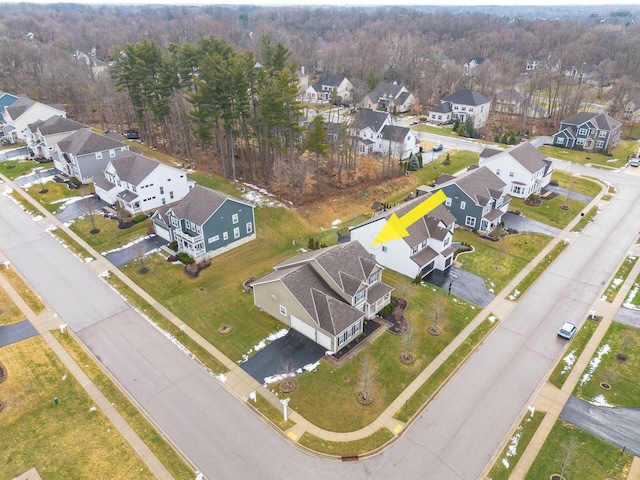 birds eye view of property with a residential view