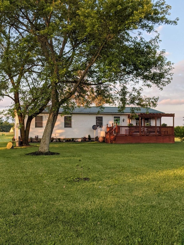 exterior space featuring a wooden deck