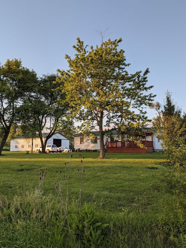 view of yard with a wooden deck