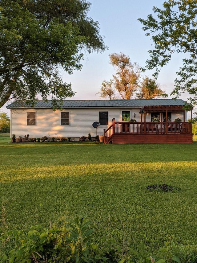 17916 Allen Center Rd, Marysville, OH 43040 - rear view of property featuring metal roof, a lawn, and a wooden deck