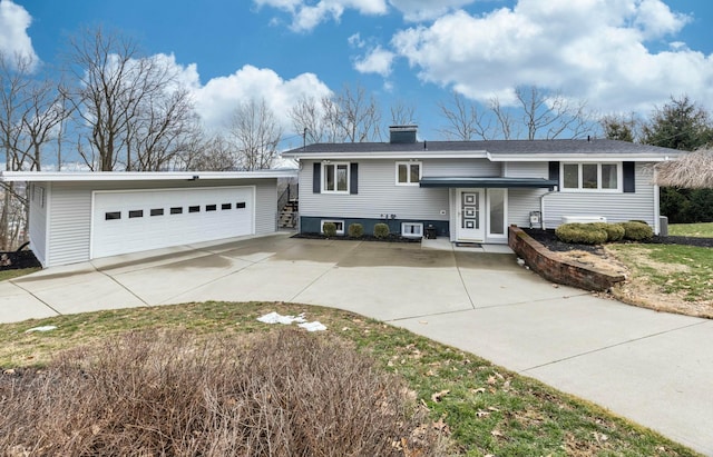 split foyer home featuring a chimney