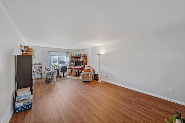 1259 Timber Ln, Marion, OH 43302 - miscellaneous room with baseboards, visible vents, and wood finished floors