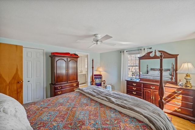 1259 Timber Ln, Marion, OH 43302 - bedroom with a closet, ensuite bath, light wood-style floors, and a ceiling fan