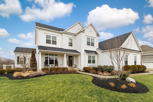 view of front of house with a porch and a front yard