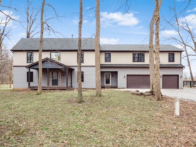 767 London Groveport Rd, Lockbourne, OH 43137 - view of front of property with a front yard, roof with shingles, driveway, and an attached garage