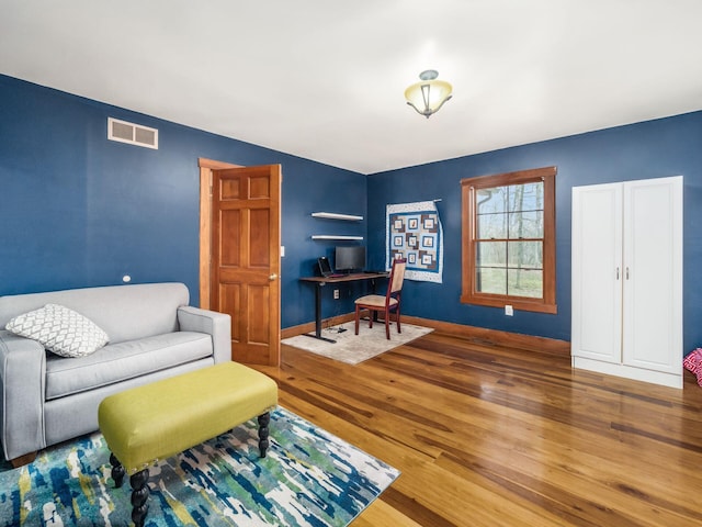 767 London Groveport Rd, Lockbourne, OH 43137 - interior space featuring visible vents, baseboards, and wood finished floors