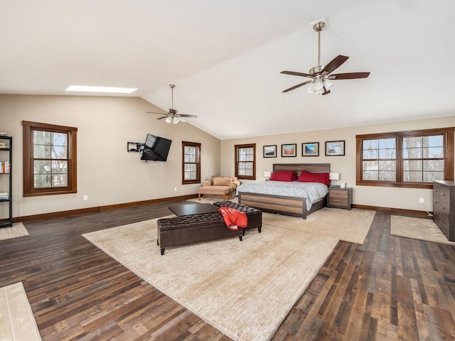 767 London Groveport Rd, Lockbourne, OH 43137 - bedroom featuring lofted ceiling with skylight, multiple windows, and dark wood-style flooring