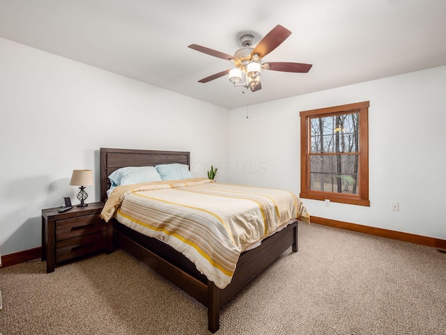 767 London Groveport Rd, Lockbourne, OH 43137 - bedroom featuring carpet, baseboards, and a ceiling fan