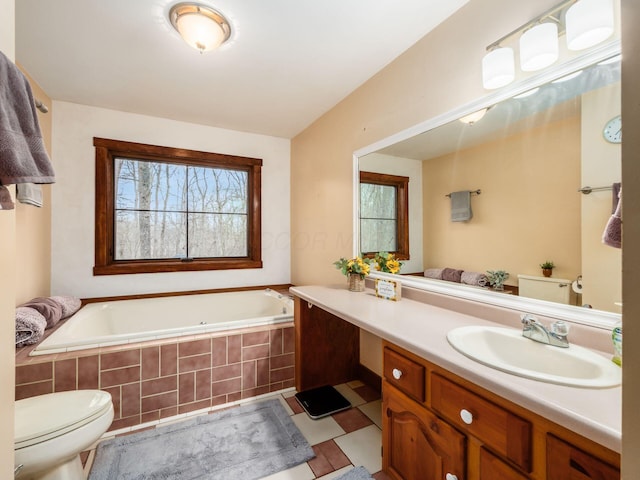767 London Groveport Rd, Lockbourne, OH 43137 - bathroom with a garden tub, vanity, and toilet