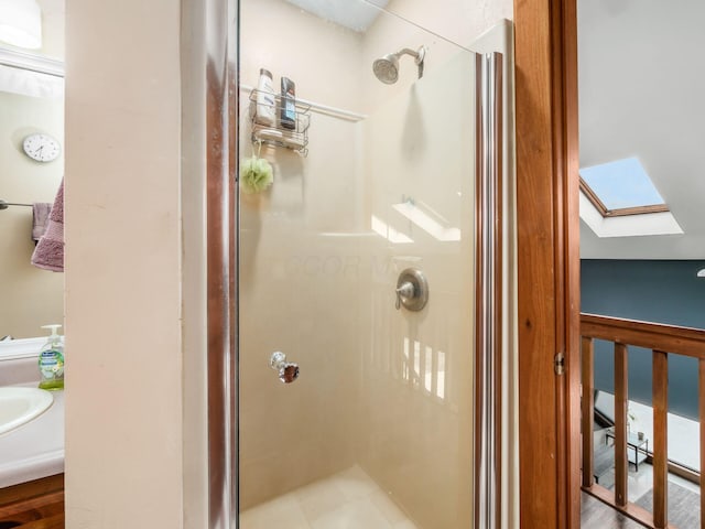 767 London Groveport Rd, Lockbourne, OH 43137 - bathroom with a skylight, a shower stall, and vanity