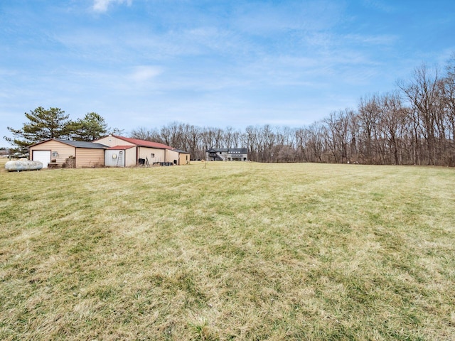 767 London Groveport Rd, Lockbourne, OH 43137 - view of yard featuring an outbuilding and a pole building