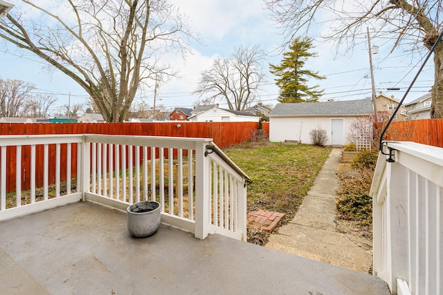 view of yard featuring an outdoor structure and a fenced backyard