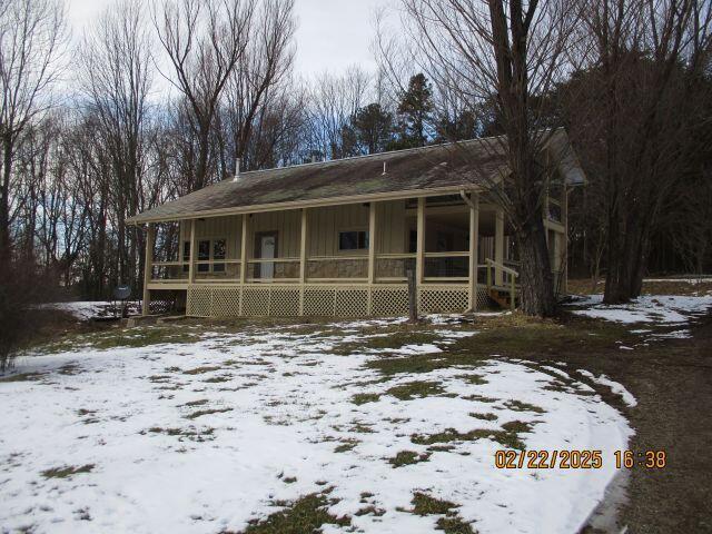 view of front of house with board and batten siding