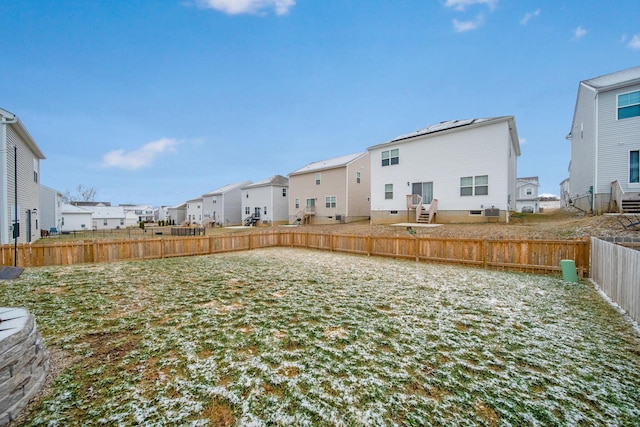 view of yard with a residential view and fence