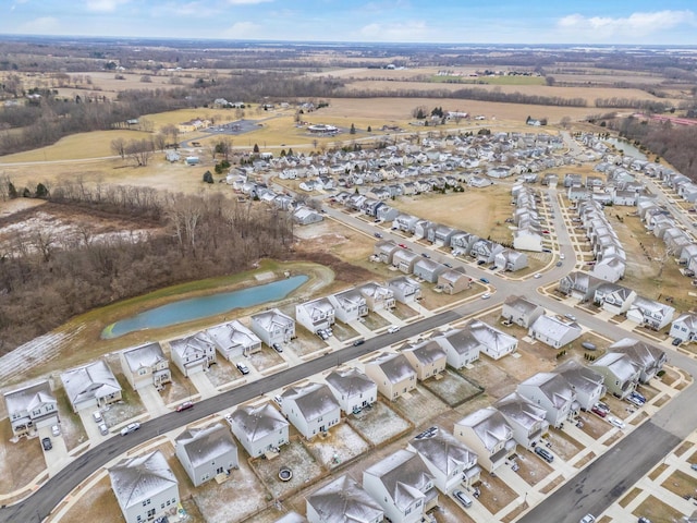 aerial view with a water view and a residential view