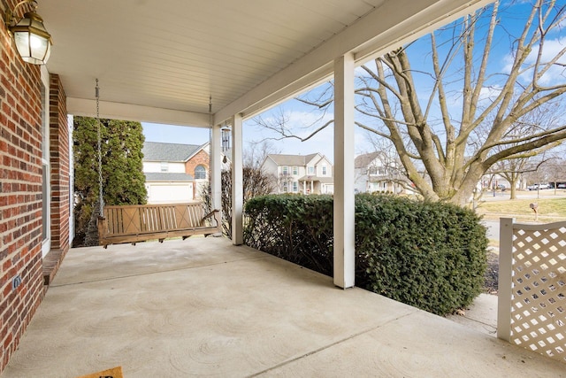 view of patio / terrace with a residential view