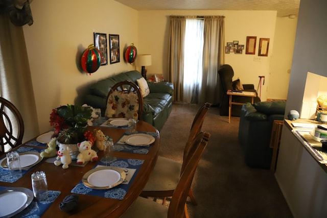 dining room featuring carpet flooring