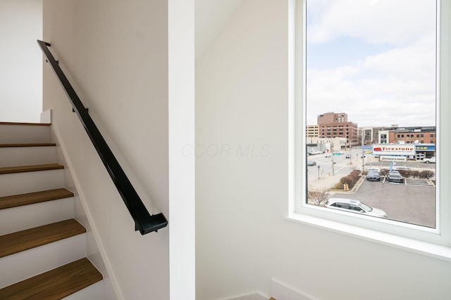 stairs featuring a view of city