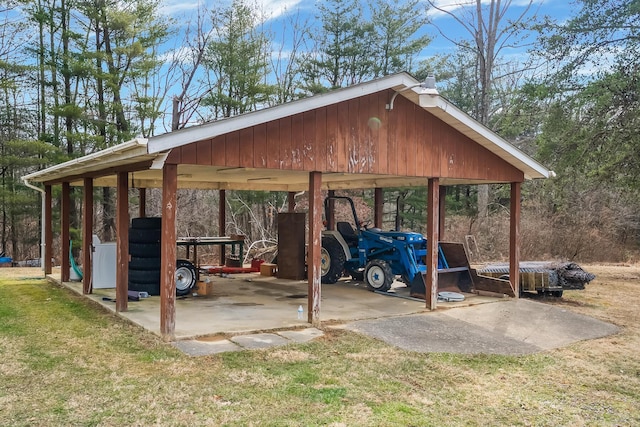 view of parking / parking lot with a carport