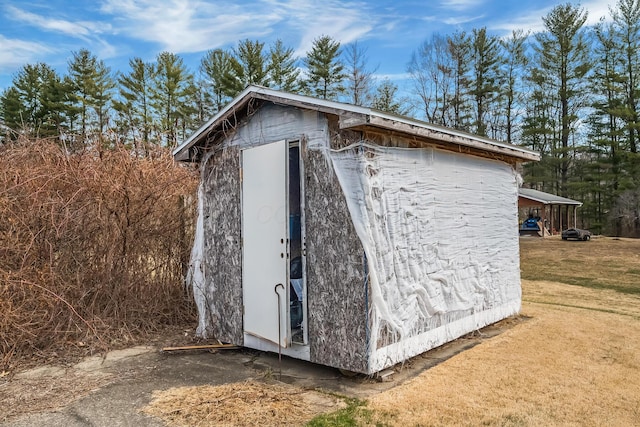 view of outbuilding with an outbuilding