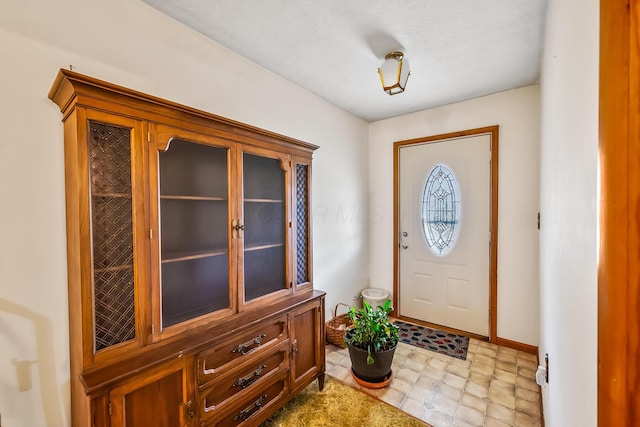 entrance foyer with baseboards