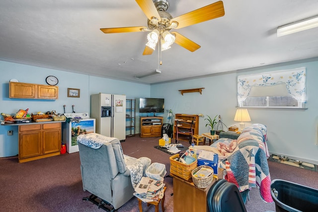 living area with dark colored carpet and ceiling fan