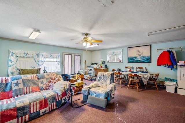 carpeted living room with a textured ceiling and ceiling fan