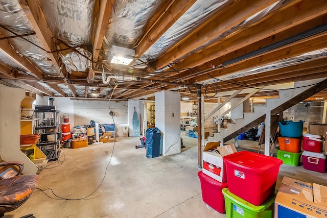 unfinished basement with stairway