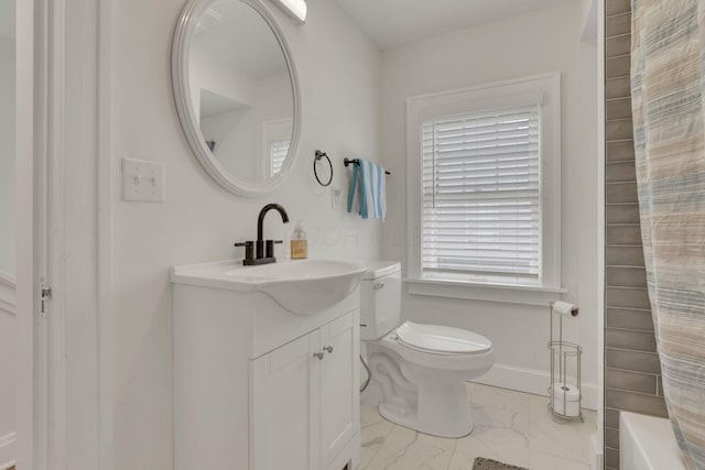 bathroom featuring shower / bath combo, baseboards, toilet, marble finish floor, and vanity