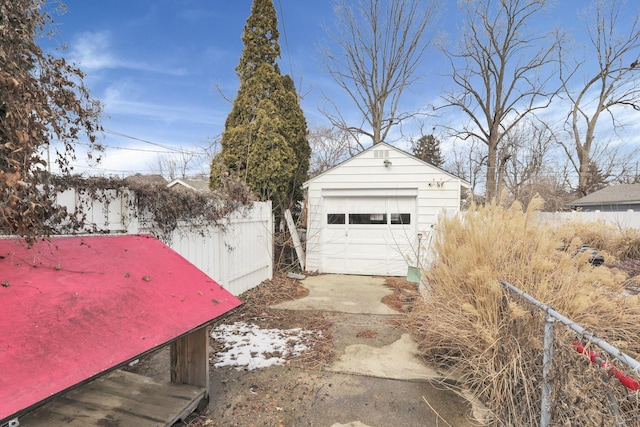 detached garage with fence