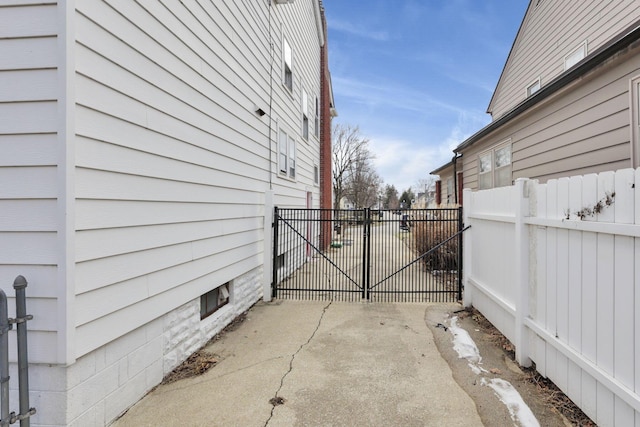 view of home's exterior with fence