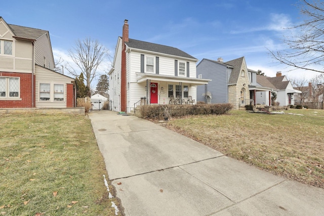 view of front of home featuring a porch, a front lawn, a chimney, and a residential view