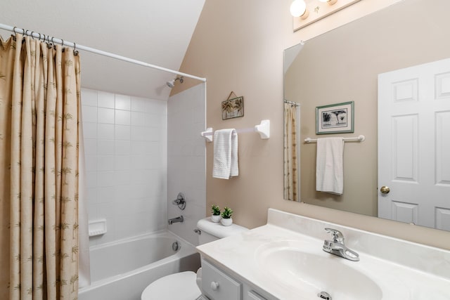 bathroom featuring shower / bath combination with curtain, vanity, and toilet