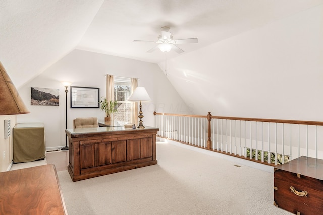 office featuring lofted ceiling, ceiling fan, and carpet flooring