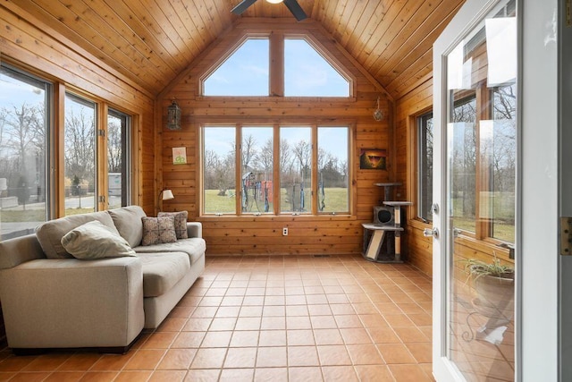 sunroom / solarium featuring wooden ceiling, vaulted ceiling, and a ceiling fan