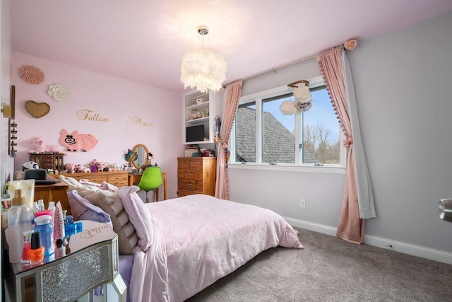 bedroom with carpet floors, a chandelier, and baseboards