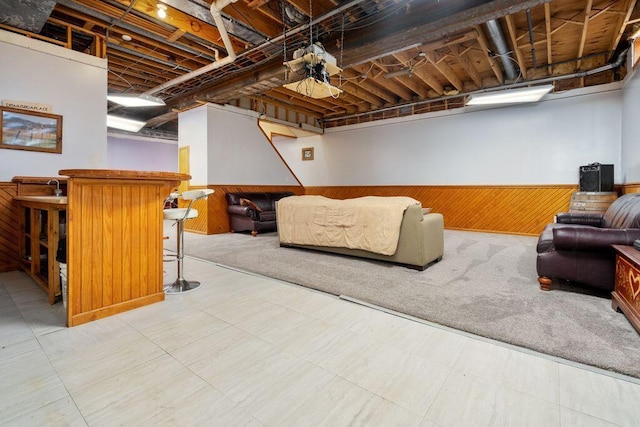 interior space featuring wood walls and wainscoting