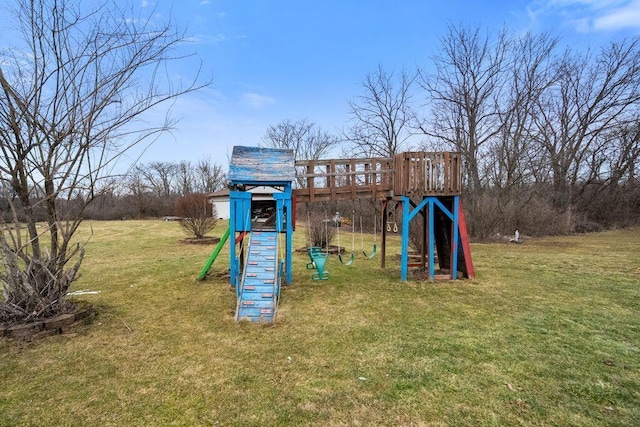 view of jungle gym with a lawn