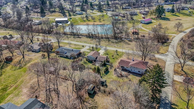 bird's eye view with a water view and a residential view