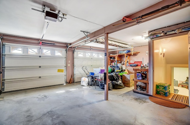 garage featuring a garage door opener