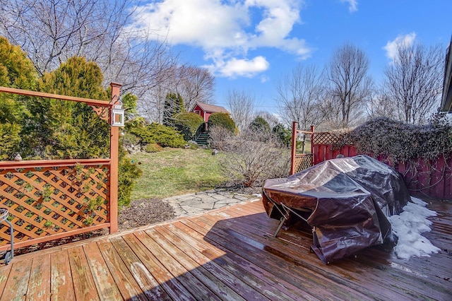 wooden deck featuring fence