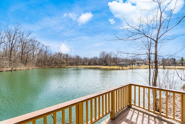 deck featuring a water view