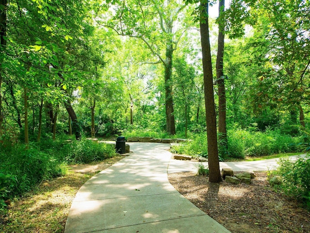 view of home's community featuring a view of trees