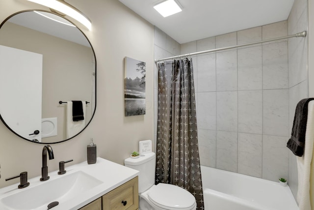 full bathroom featuring shower / tub combo with curtain, vanity, and toilet