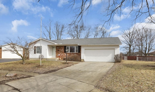 view of front of property with a garage, brick siding, concrete driveway, fence, and stucco siding