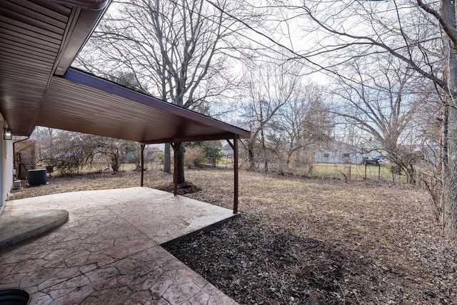 view of yard featuring a patio area and fence